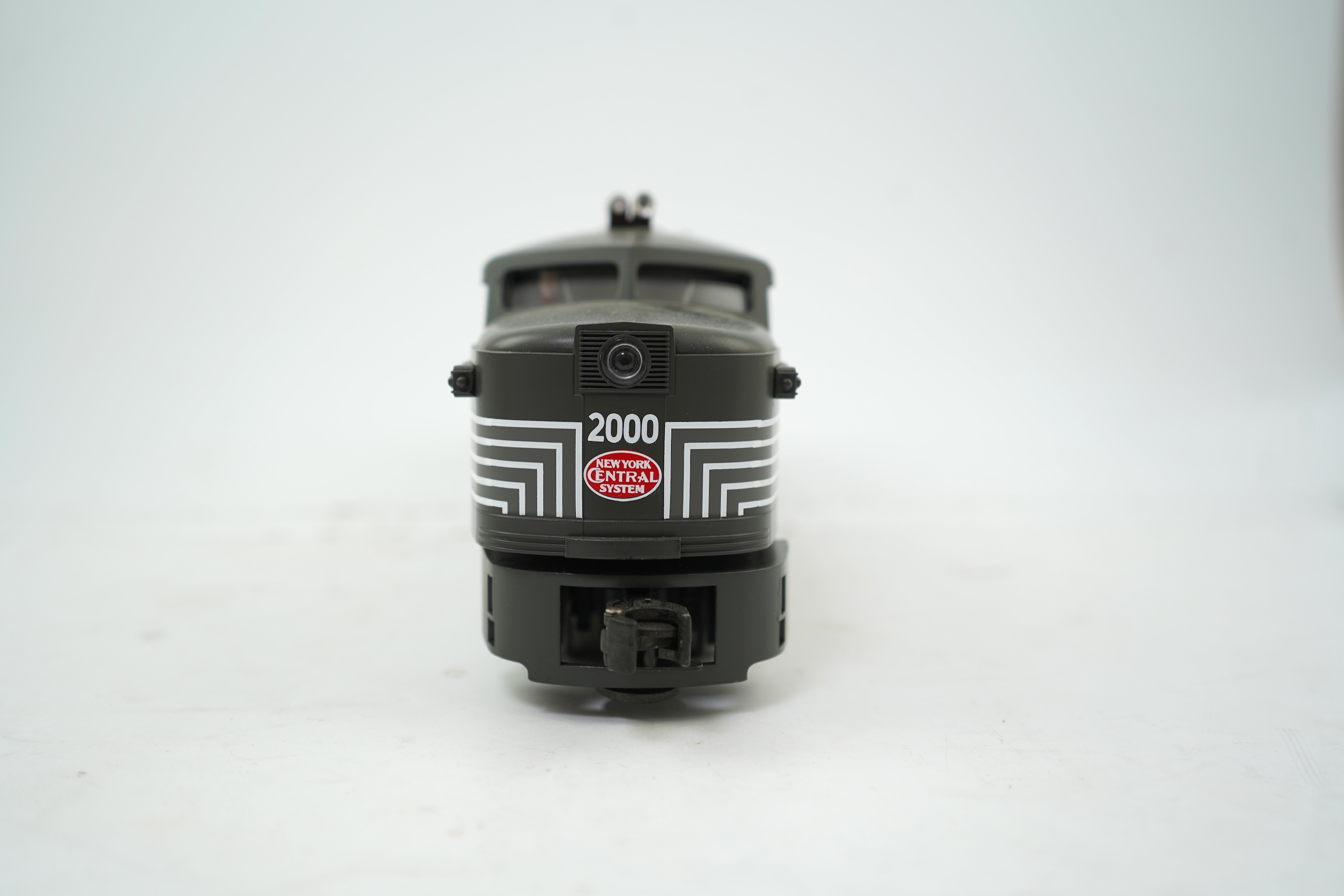 An 0 Gauge Lionel model of Alco PA-1 New York Central 2000, A1A-A1A diesel locomotive, powered for free rail operation, with owner’s manual.